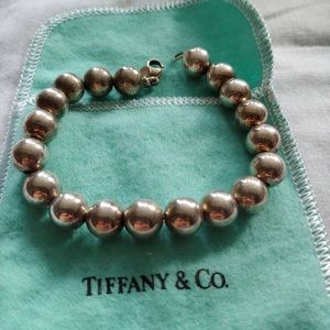 Authentic Tiffany’s bead bracelet with extra bead and link to make larger.